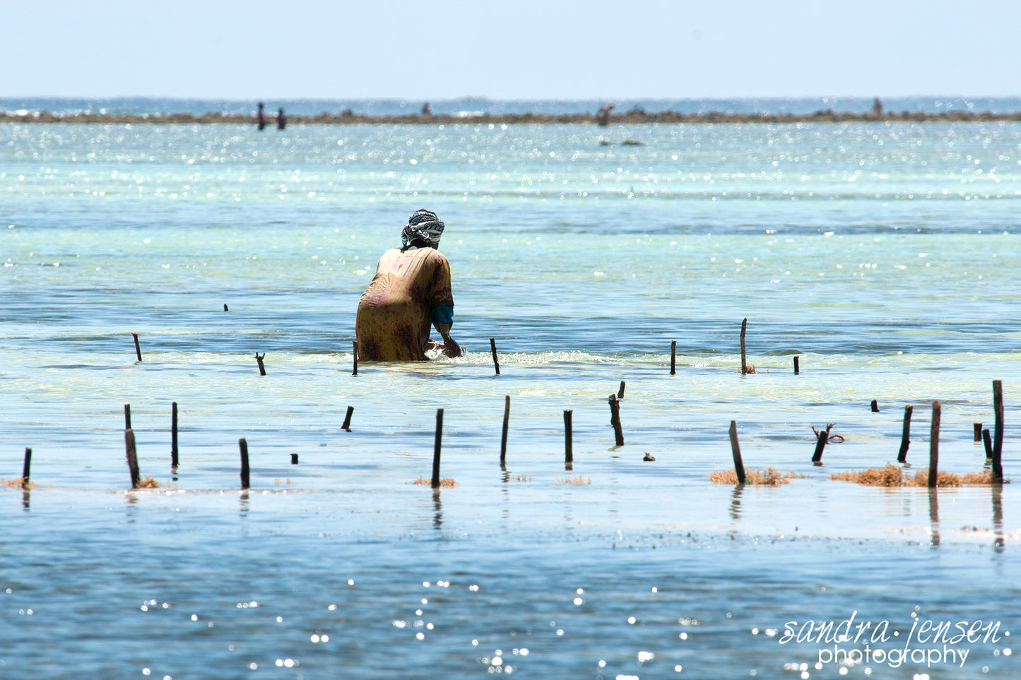Print - Zanzibar, Tanzania - Woman working at Matemwe Beach